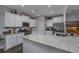 Modern kitchen with stainless steel appliances, white cabinets, and granite countertops at 440 Craigflower Ct., Longs, SC 29568