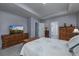 Spacious bedroom with neutral paint, carpet, and walk in closet at 440 Craigflower Ct., Longs, SC 29568