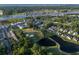 Overhead view of golf course, condos, neighborhood, and lake community near the ocean at 4459 Turtle Ln. # 3D, Little River, SC 29566