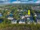Aerial view of condo community situated on a lush green golf course with small ponds at 4459 Turtle Ln. # 3D, Little River, SC 29566