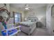 This bedroom is well decorated with a ceiling fan and beachy, nautical décor at 4459 Turtle Ln. # 3D, Little River, SC 29566