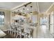 Kitchen with marble counter on bar with stools and full view of door to porch at 4459 Turtle Ln. # 3D, Little River, SC 29566