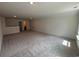 Expansive bonus room featuring plush carpeting, recessed lighting, and neutral paint, offering versatile space at 456 Sun Colony Blvd., Longs, SC 29568