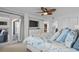 Bright bedroom with access to balcony and large bed at 517 S Ocean Blvd. # 506, North Myrtle Beach, SC 29582