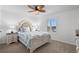 Guest bedroom with large bed and ocean view at 517 S Ocean Blvd. # 506, North Myrtle Beach, SC 29582