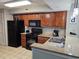 Well-equipped kitchen with granite countertops and modern appliances at 5300 N Ocean Blvd. # 1005, Myrtle Beach, SC 29577