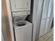 Stackable washer and dryer set in a small laundry closet at 5300 N Ocean Blvd. # 1005, Myrtle Beach, SC 29577