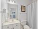 Bright bathroom features a vanity with drawers and a shower with a curtain at 5825 Catalina Dr. # 332, North Myrtle Beach, SC 29582
