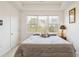 King-size bed in a well-lit bedroom with large windows at 5825 Catalina Dr. # 332, North Myrtle Beach, SC 29582