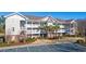 Two-story condo building with balconies and parking at 5825 Catalina Dr. # 332, North Myrtle Beach, SC 29582
