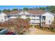 Two-story condo building with balconies and parking at 5825 Catalina Dr. # 332, North Myrtle Beach, SC 29582