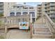 Beach toy library available for community use with a walkway to the beach behind at 5825 Catalina Dr. # 332, North Myrtle Beach, SC 29582