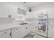 White kitchen with appliances and ample cabinet space at 5825 Catalina Dr. # 332, North Myrtle Beach, SC 29582