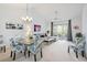 Bright living room featuring a sectional sofa and dining area at 5825 Catalina Dr. # 332, North Myrtle Beach, SC 29582