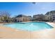 Community pool with pool house and lounge chairs at 5825 Catalina Dr. # 332, North Myrtle Beach, SC 29582