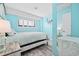 Bedroom featuring neutral paint, wood floors, and a decorative bedside table at 5905 S Kings Hwy. # 312-C, Myrtle Beach, SC 29575