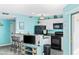 Charming kitchen with bar stool seating, modern appliances, and a seamless flow to the living space at 5905 S Kings Hwy. # 312-C, Myrtle Beach, SC 29575
