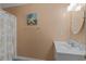 Clean bathroom with single sink vanity and shower/tub combo at 6001-1830A S Kings Highway, Myrtle Beach, SC 29575