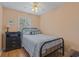 Cozy bedroom with a double bed, dresser, and ceiling fan at 6001-1830A S Kings Highway, Myrtle Beach, SC 29575