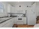 White cabinets, stainless steel appliances and granite countertops at 6001-1830A S Kings Highway, Myrtle Beach, SC 29575