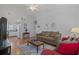 Cozy living room featuring a brown sofa and a wood coffee table at 6001-1830A S Kings Highway, Myrtle Beach, SC 29575