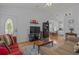 Open living space with hardwood floors, comfortable seating, and a view of the kitchen at 6001-1830A S Kings Highway, Myrtle Beach, SC 29575