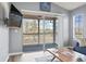 Enclosed patio with ceiling fan, sliding glass door and views of the outdoors at 627 Waterway Village Dr. # 8-I, Myrtle Beach, SC 29579