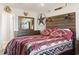 Comfortable bedroom featuring Southwest decor, wall art, and wood headboard at 627 Waterway Village Dr. # 8-I, Myrtle Beach, SC 29579