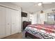 Tastefully decorated bedroom featuring white closet doors and a ceiling fan at 627 Waterway Village Dr. # 8-I, Myrtle Beach, SC 29579