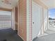 Hallway with side view of unit doors and balcony with community views at 627 Waterway Village Dr. # 8-I, Myrtle Beach, SC 29579