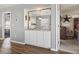 Interior view of a room featuring a built-in bar with a passthrough to the kitchen at 627 Waterway Village Dr. # 8-I, Myrtle Beach, SC 29579