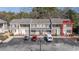 A charming townhouse showcases neat landscaping and designated parking spaces for convenient access at 6702 Jefferson Pl. # B6, Myrtle Beach, SC 29572