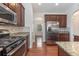 Kitchen boasts stainless steel appliances and granite countertops at 700 Harbor Bay Dr., Murrells Inlet, SC 29576