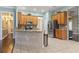 Modern kitchen featuring an island, stainless steel appliances, granite countertops, and ample cabinet space at 720 Dove Haven Ln., Myrtle Beach, SC 29579