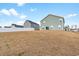 View of the home's backyard with slider to the back patio at 1052 Kinness Dr., Conway, SC 29527