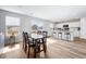 Dining area adjacent to the kitchen with a wooden table, chairs, and natural light at 1052 Kinness Dr., Conway, SC 29527