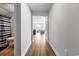 Hallway with a bathroom to the left and views of the living room and dining area ahead at 1052 Kinness Dr., Conway, SC 29527