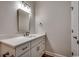 Bathroom featuring a large mirror and white vanity with ample storage space at 106 Riverwatch Dr., Conway, SC 29527