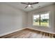 Bedroom featuring a ceiling fan, and a large window with exterior views at 106 Riverwatch Dr., Conway, SC 29527