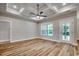 Bright living room featuring hardwood floors, recessed lighting, and a view to the backyard at 106 Riverwatch Dr., Conway, SC 29527