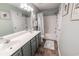 Bathroom showcasing a double sink vanity, shower over tub and tile flooring at 1061 Pinwheel Loop # 1061, Myrtle Beach, SC 29577