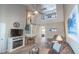 Spacious living room featuring a fireplace, ceiling fan, and staircase to the second floor at 1061 Pinwheel Loop # 1061, Myrtle Beach, SC 29577