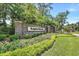 Attractive brick entrance to Kingston Plantation with lush landscaping at 108 Rothbury Circle # 207, Myrtle Beach, SC 29572