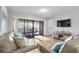 Living room with light beige couch and glass coffee table at 108 Rothbury Circle # 207, Myrtle Beach, SC 29572