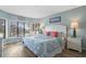 Spacious main bedroom with a king-size bed and tranquil water views at 108 Rothbury Circle # 207, Myrtle Beach, SC 29572