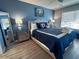 A well-lit primary bedroom features a large mirror and coastal decor at 109 Westhill Circle # 3-C, Myrtle Beach, SC 29572