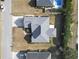 Overhead home view shows roof style and layout amid the neighborhood at 116 Cypress Estates Dr., Murrells Inlet, SC 29576