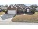 Charming single-story home features a two-car garage, brick facade, and well-maintained landscaping at 116 Cypress Estates Dr., Murrells Inlet, SC 29576