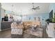 Cozy living room showcasing a sofa, arm chair, and stylish rug in an open floor plan at 116 Cypress Estates Dr., Murrells Inlet, SC 29576