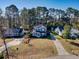 Detailed aerial perspective showing the house, its surroundings, and other neighborhood structures and landscaping features at 116 Great Lakes Rd., Pawleys Island, SC 29585